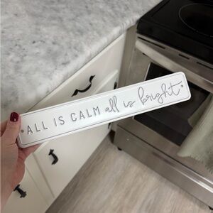 White Decorative Sign with Script Text